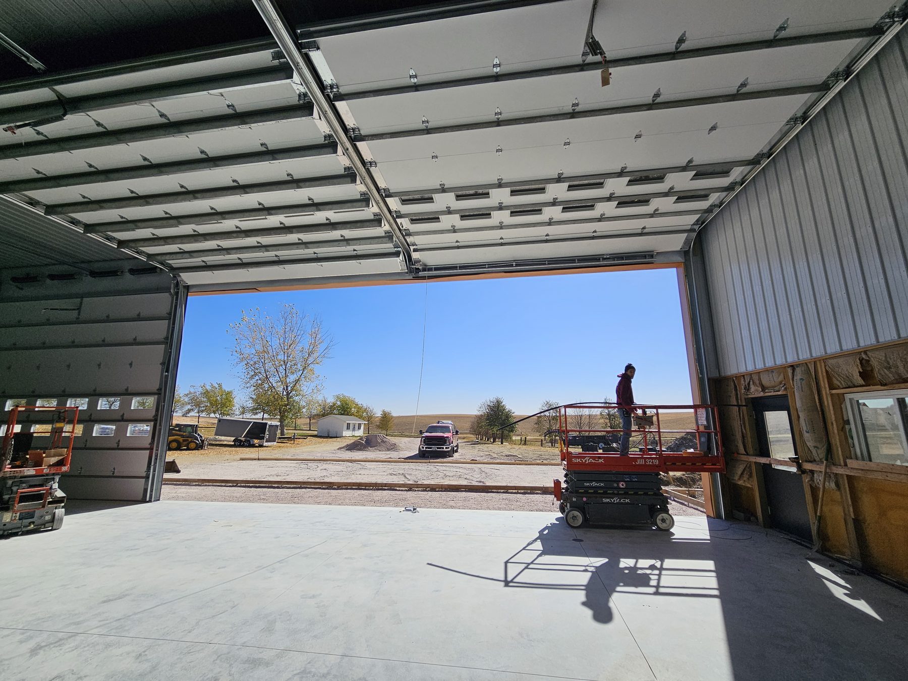 Shop building suited for conversion or new overhead door openings